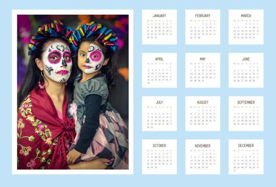 A calendar with a picture of the Day of the Dead celebration